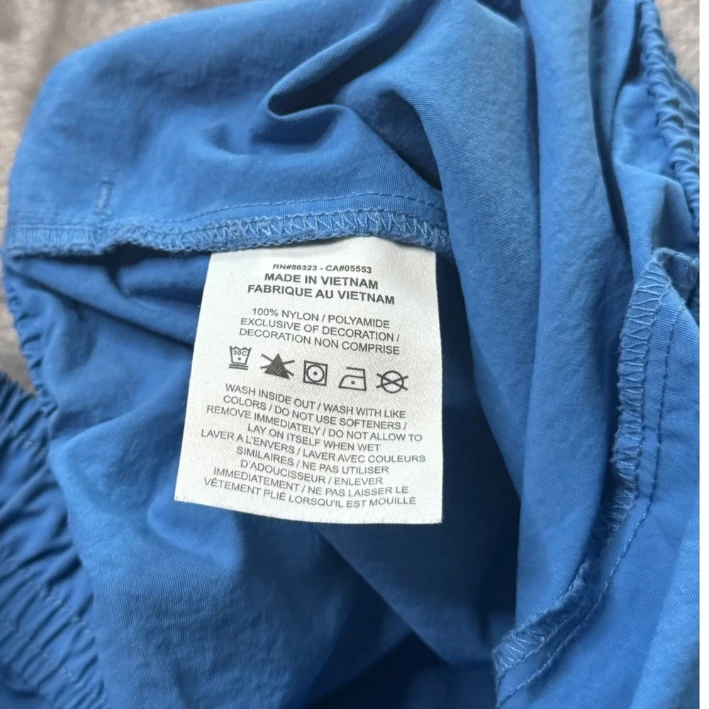 Nike Womens XL Everything Wovens Mid Rise Pants Star Blue Open Hem Baggy